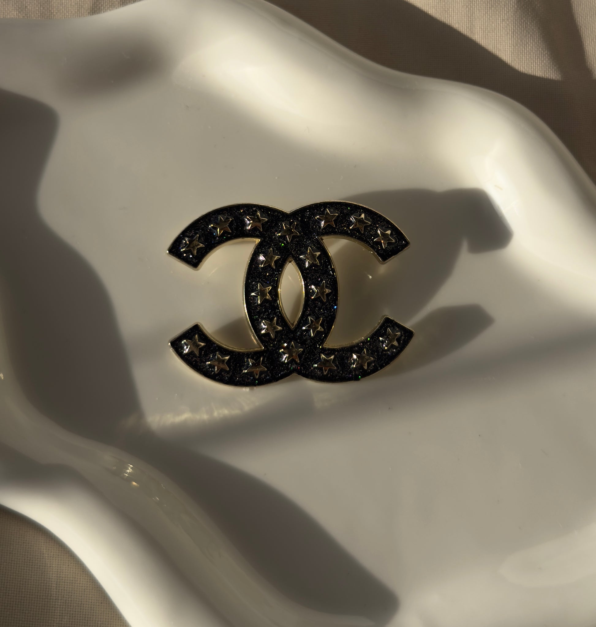 Spilla stars Luxury